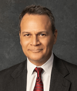 man in suit smiling