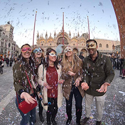 students wearing masks with confetti