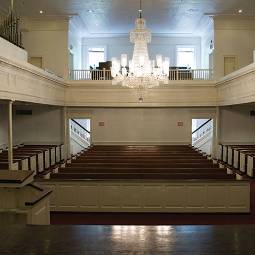 view of chapel from behind the podium, chandelier