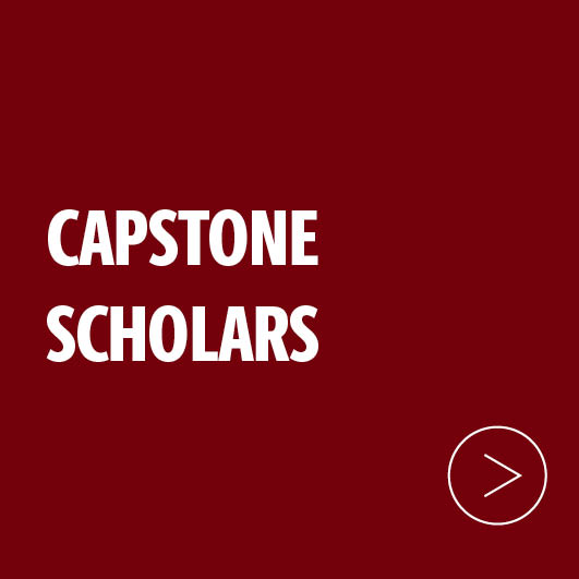 Garnet box with text that says capstone scholars.