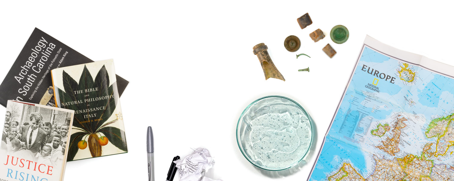 Various items related to the College of Arts and Sciences displayed on a white background. 