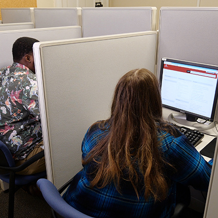 Students taking exam in testing center