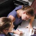 Students studying with professor