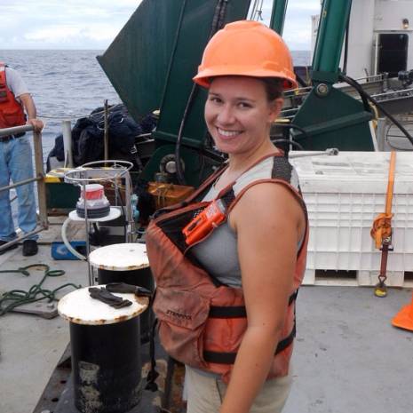 woman on a boat with a hard hat