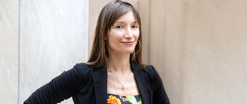 Woman smiling with black jacket on