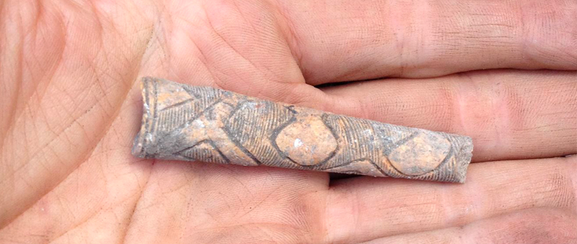 Recovered artifact in hand