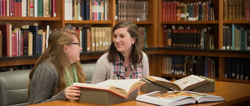 Female students really happy to be studying