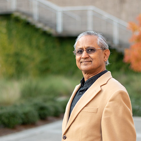 Sheth in courtyard.