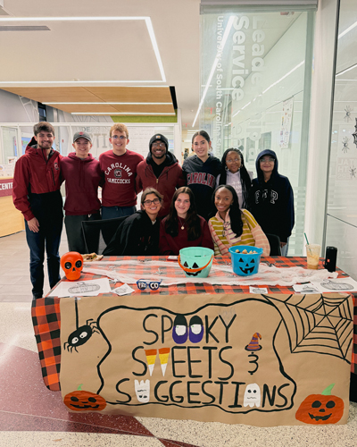 Evan Lawton tabling with other student government members.