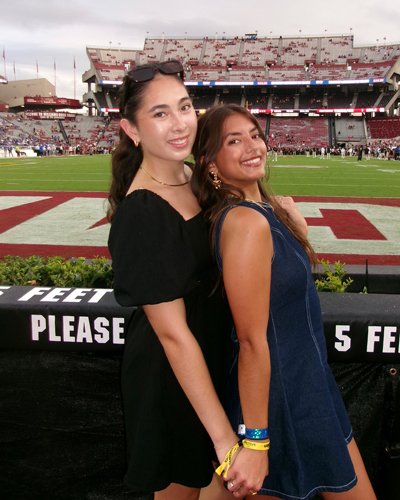Maya Woodruff with a friend at a South Carolina football game.