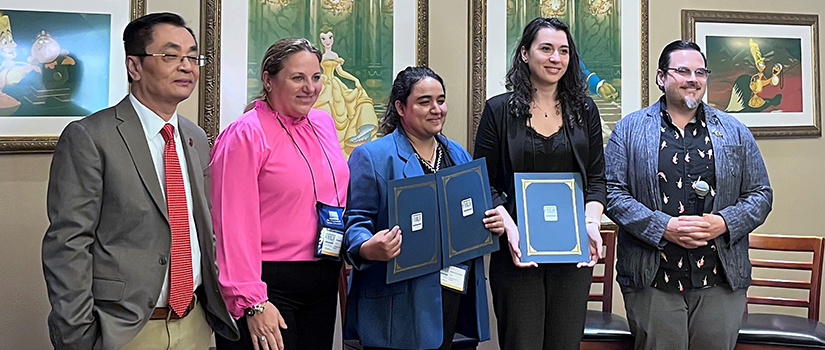 Marketa Kubickova poses with Lali Odosashvili and Swchchha Subedi after receiving the Best Student-Led Completed Paper Award at the SECSA-CHRIE conference.