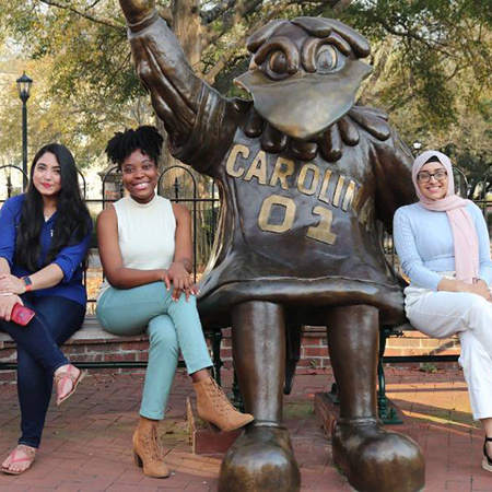 Students with Cocky statue