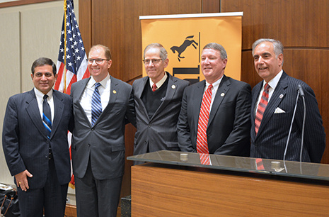 Continental Tire executives and Carolina alumni Todd Pearce and George Jurch helped announce the Continental Endowed Chair in Global Supply Chain Management and Management Science. Pictured from left are Manoj Maholtra, Pearce, Peter Brews, Jurch and Harris Pastides.