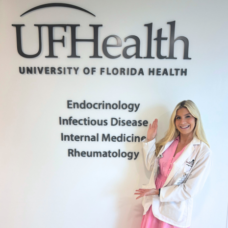Acker with UFHealth sign