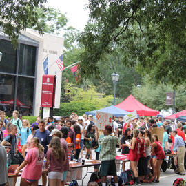 students tabling at the student org fair on Greene Street