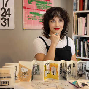 Meena Khalili sits among some of her artwork in her office