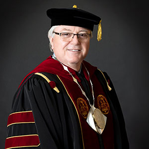 President Amiridis dressed in academic regalia